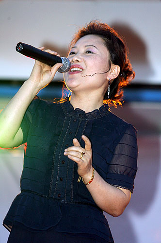 이번 참가자는 연변이 고향인 주민의 '휘파람'.[사진-통일뉴스 김주영 기자]