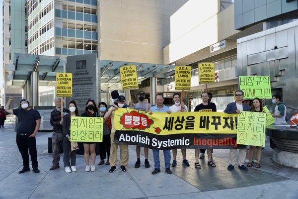 민주노총의 ‘7.2 전국노동자대회’를 지지하는 재미동포들의 집회가 25일 로스앤젤레스의 한인 밀집지역에서 열렸다. [사진-통일뉴스 송영애 통신원]