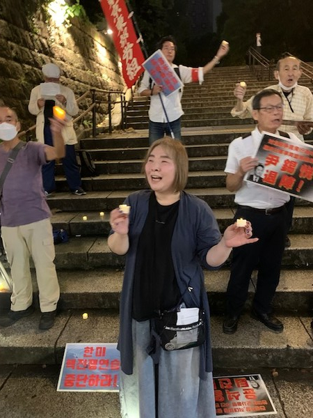 아침이슬을 합창하는 참가자들. [사진-통일뉴스 박명철 통신원]