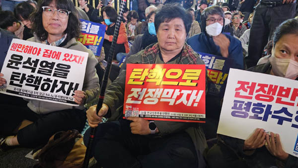 오늘의 중심 구호! [사진 - 통일뉴스 하태한 통신원]