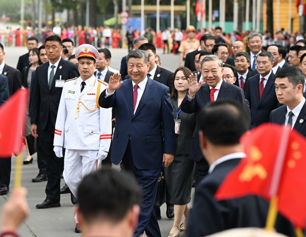 14일 하노이에서 만난 시진핑 중국 국가주석과 또럼 베트남공산당 서기장. [사진-중 외교부]